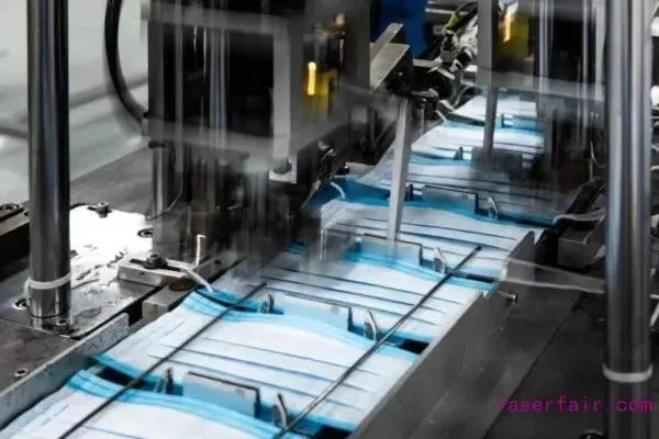 急国家之所急，激光企业跨界生产口罩机一举多得